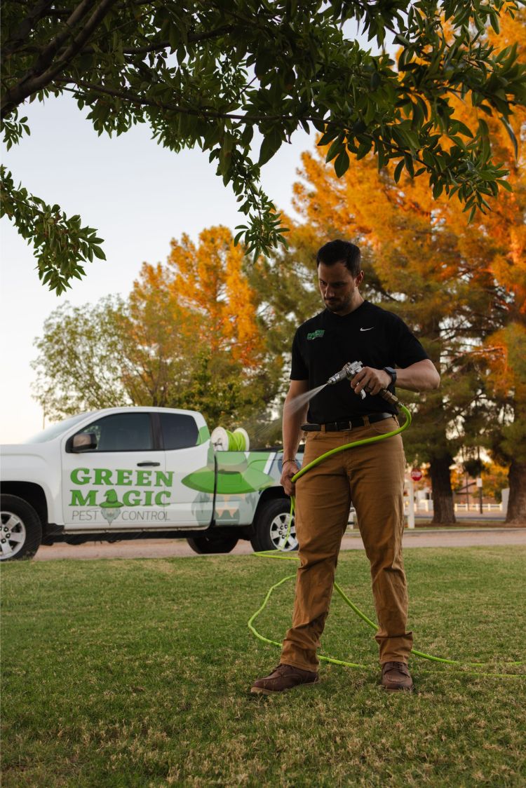 Tempe AZ pest control services technician treating a rental property before move in